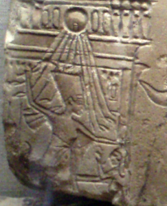 640px-NefertitiRelief_SmitingSceneOnBoat-CloseUp